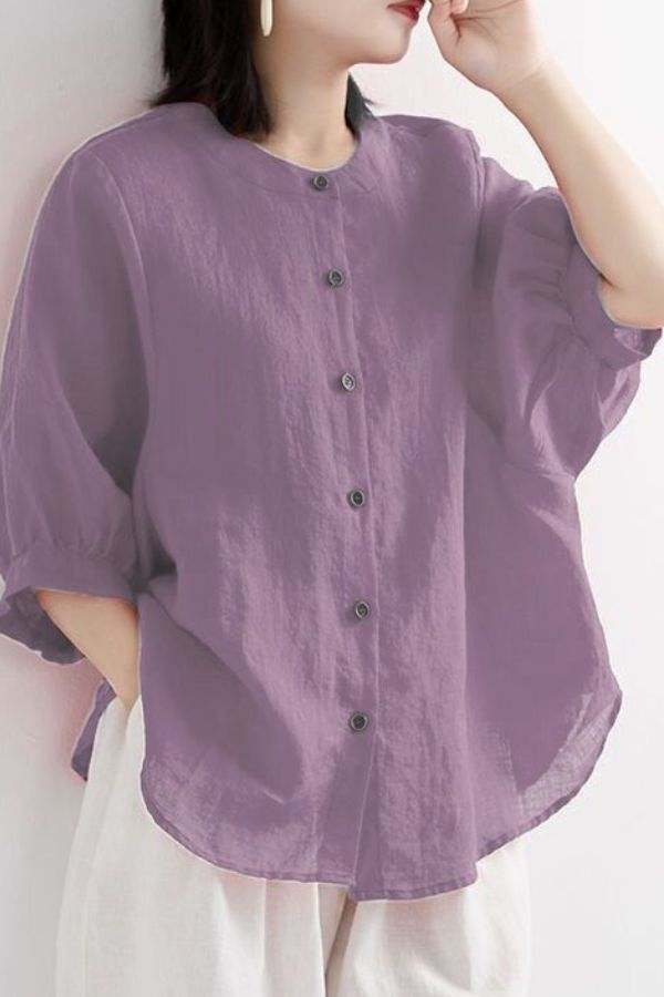 Relaxed loose breathable linen blouse in soft purple with button-down front and loose sleeves