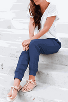 Woman wearing relaxed chic elastic ankles pants styled for everyday comfort and elegance