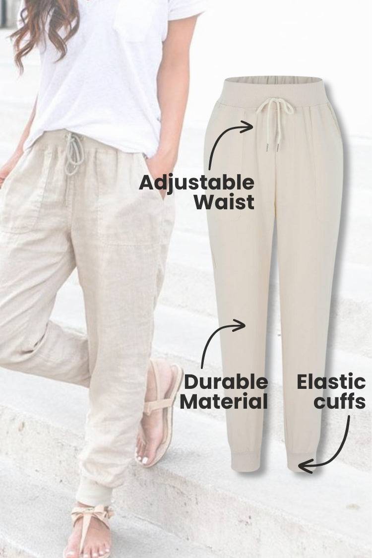 Woman wearing relaxed chic elastic ankles pants styled with casual top and sneakers outdoors
