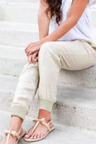 Women wearing relaxed chic elastic ankle pants in casual stylish poses