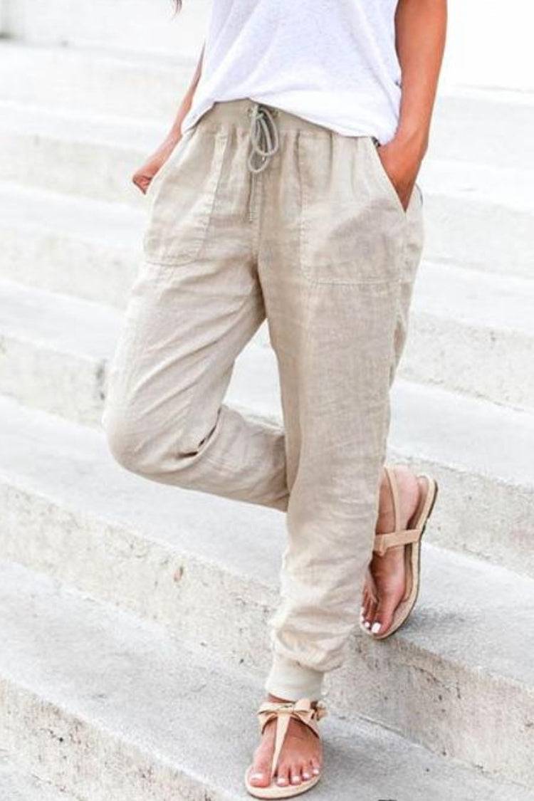 Women wearing relaxed chic elastic ankles pants in casual outdoor setting