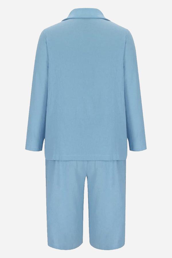 Light blue blazer and high-waisted shorts two-piece set back view