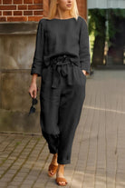 Woman wearing black Casual Chic Duo breathable cotton-linen two-piece set walking outdoors