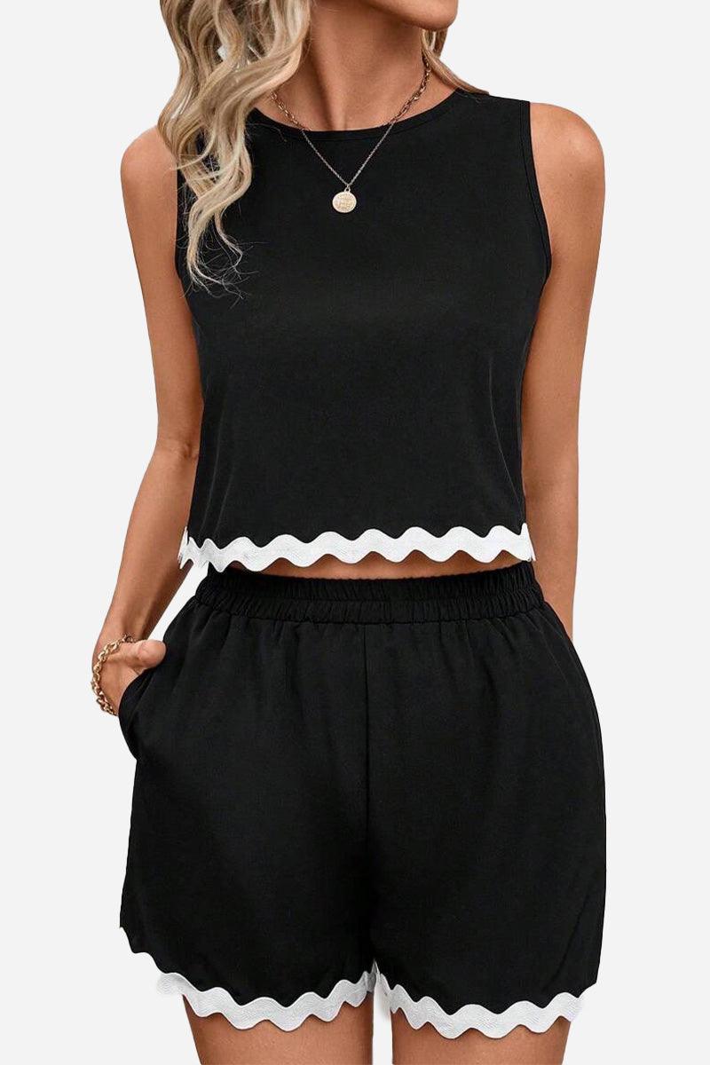 Flattering Coastal Scallop black two-piece set with scalloped hem, breathable soft fabric, and comfortable fit