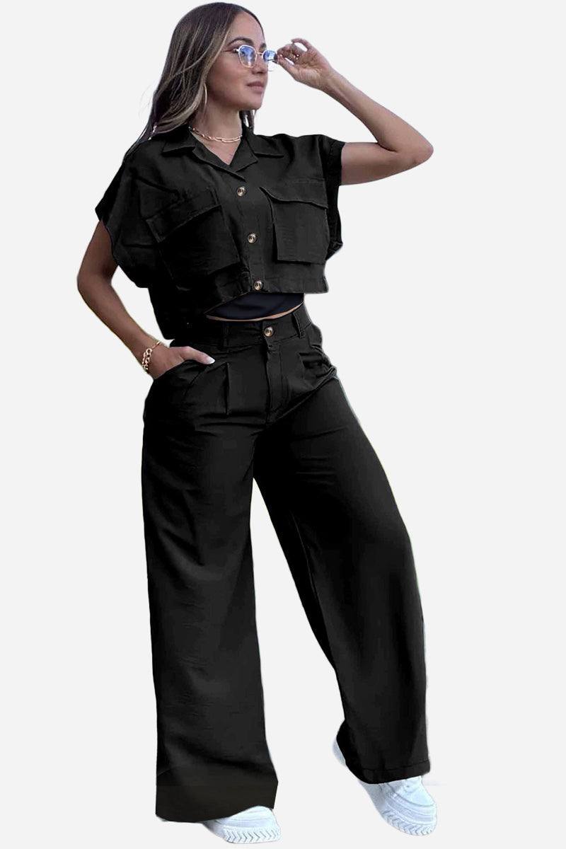 Black two-piece set with big functional pockets, cropped top, and wide-leg pants for comfortable, stylish everyday wear.