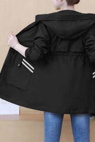 Black Cityscape Comfort Hooded Windbreaker with plush lining and mid-length fit for stylish cold-weather wear