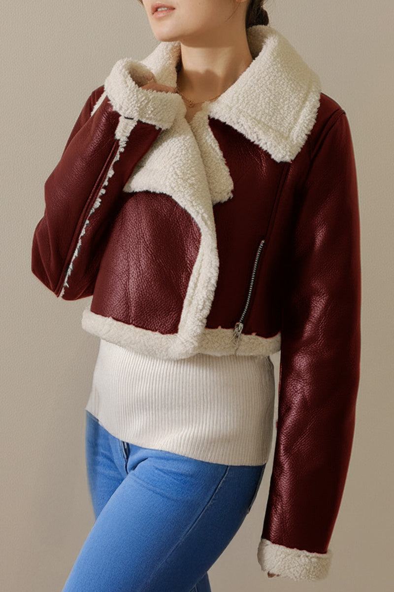 Cropped faux leather sherpa jacket with cream trim and full fleece lining in burgundy color