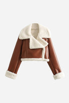 Cropped faux leather jacket with cream sherpa lining and trim, warm and stylish for casual and dressy wear