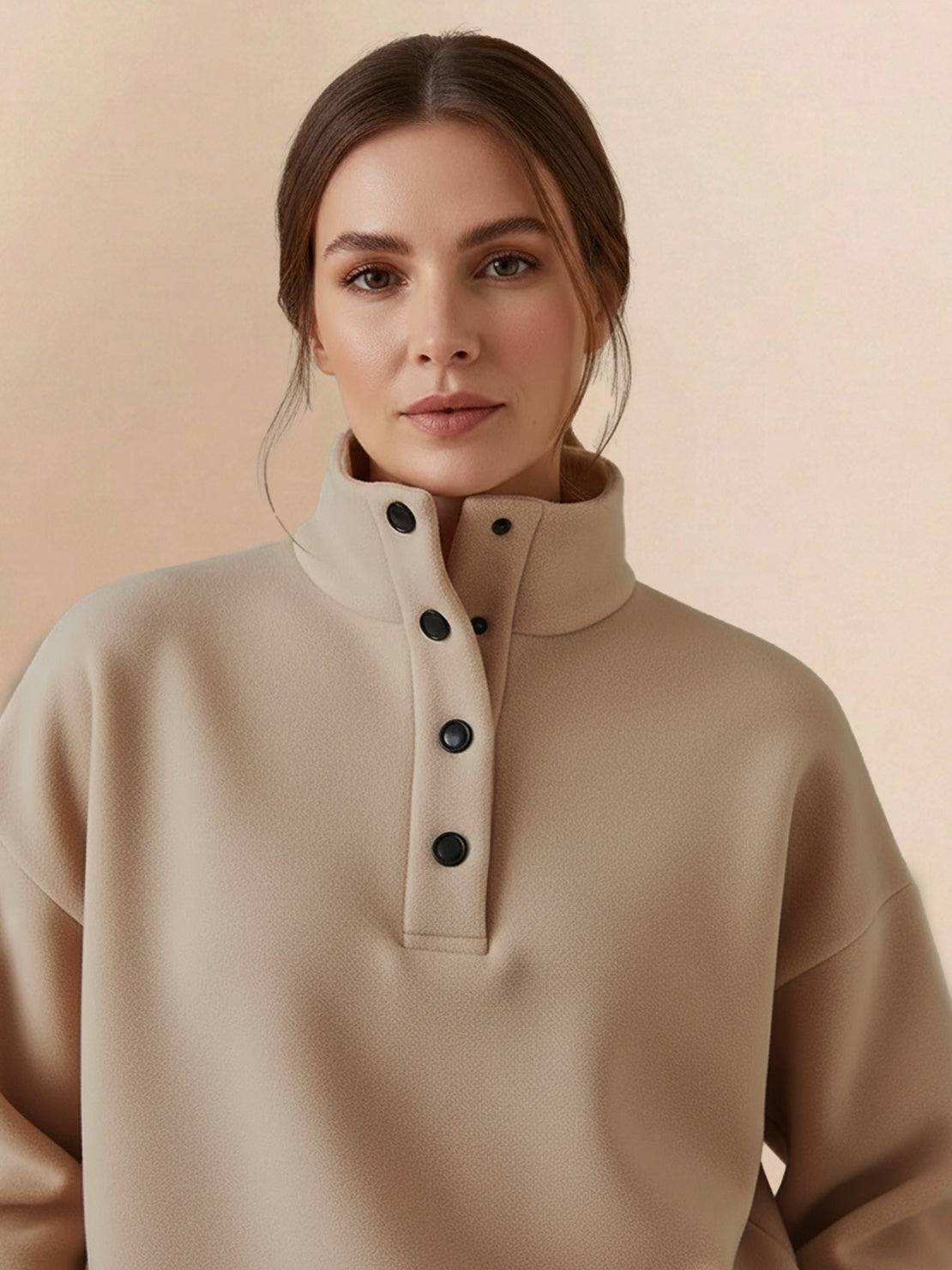 Woman wearing beige warm and easy two-piece set pullover hoodie with button collar and relaxed fit