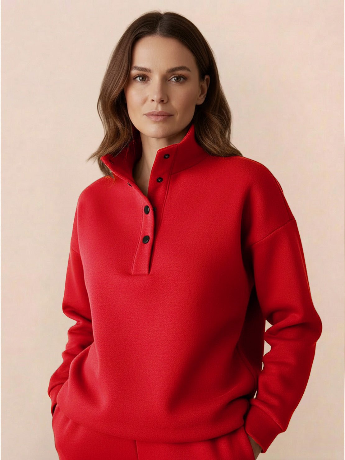 Woman wearing a red Warm & Easy Two-Piece Set pullover sweatshirt with button collar, relaxed fit and soft fabric
