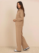 Wrinkle-Free Polo Set two-piece matching loungewear with quarter-button top and high-waisted pants in breathable fabric