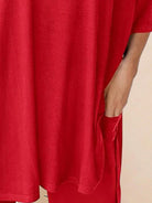 Oversized long-line loungewear set with pullover and wide-leg pants in soft knit fabric