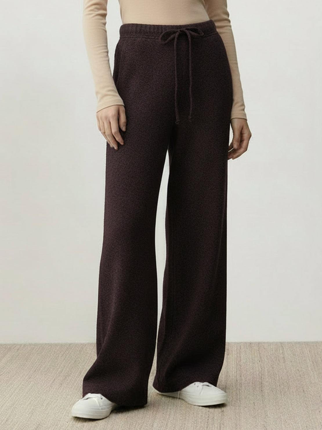 lightweight wool wide leg pants in neutral color with soft brushed texture and relaxed fit