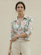 Floral button-down shirt with long roll-up sleeves and relaxed fit for casual and workwear