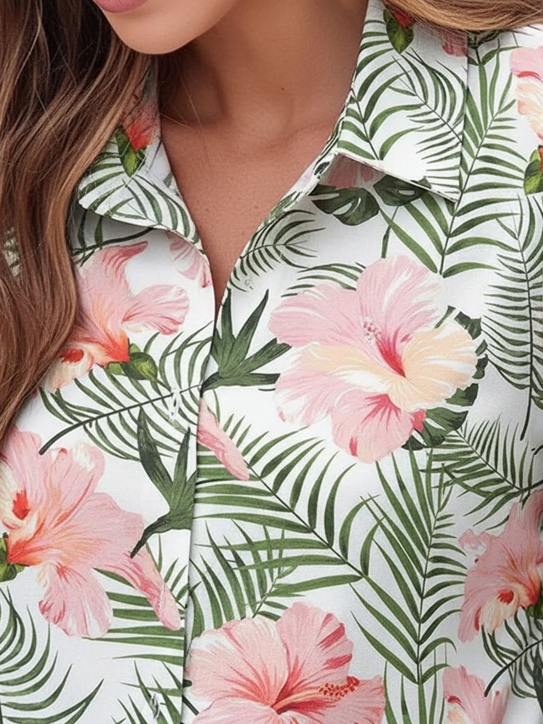 Floral button-down shirt with long roll-up sleeves and hip-length relaxed fit