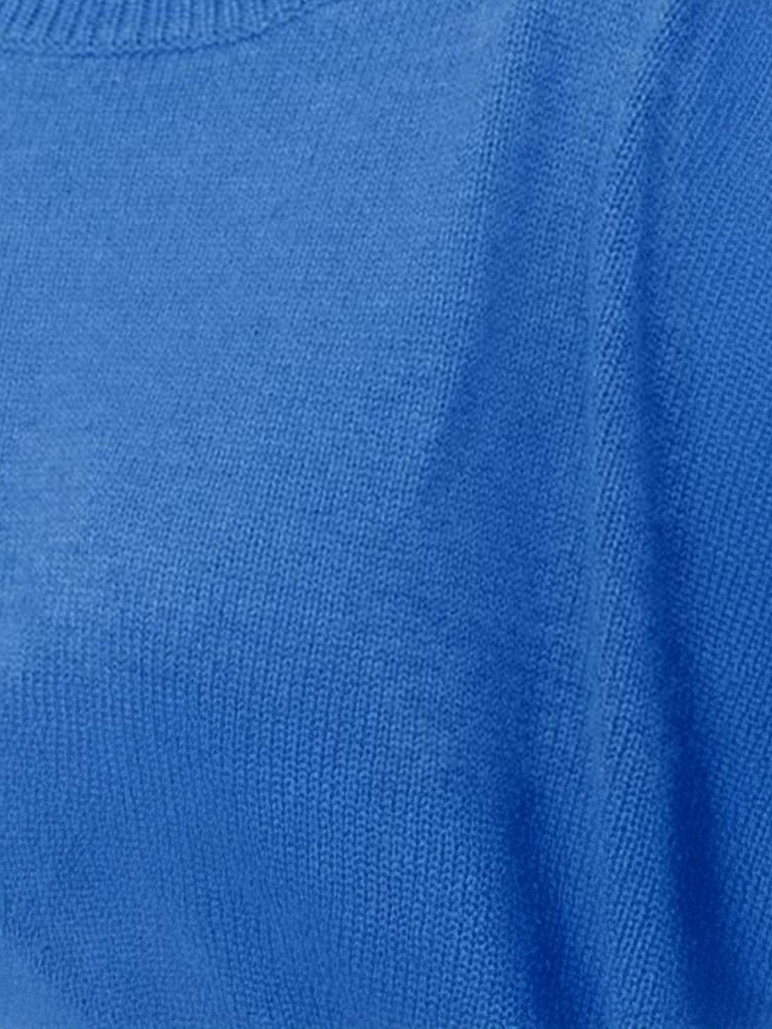 Oversized crew neck knit sweater with drop-shoulder sleeves and ribbed cuffs in neutral color