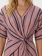 Knot-waist maxi dress with twist-knot front, V-neckline, batwing sleeves, flowing skirt, and side pockets