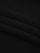 Oversized cable-knit crewneck sweater with dropped shoulders and ribbed trim in thick plush fabric