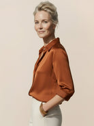 Silk-finish button front shirt with traditional collar and relaxed fit