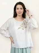 Cotton-linen embroidered blouse with 3/4 balloon sleeves and relaxed boxy fit