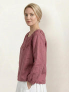 Cotton-linen embroidered blouse with relaxed boxy fit, 3/4 balloon sleeves, and tonal floral detail on shoulder