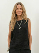 100% cotton crinkle sleeveless top and straight-leg pants set in breathable lightweight fabric