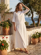 Woman wearing 100% cotton two-piece set with a crinkle finish wrap skirt and hip-length top