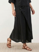 100% cotton two-piece wrap skirt set with crinkle texture, hip-length top, and ankle-length A-line skirt with pockets