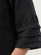 Two-piece 100% cotton wrap-front maxi skirt and hip-length top set with crinkle texture