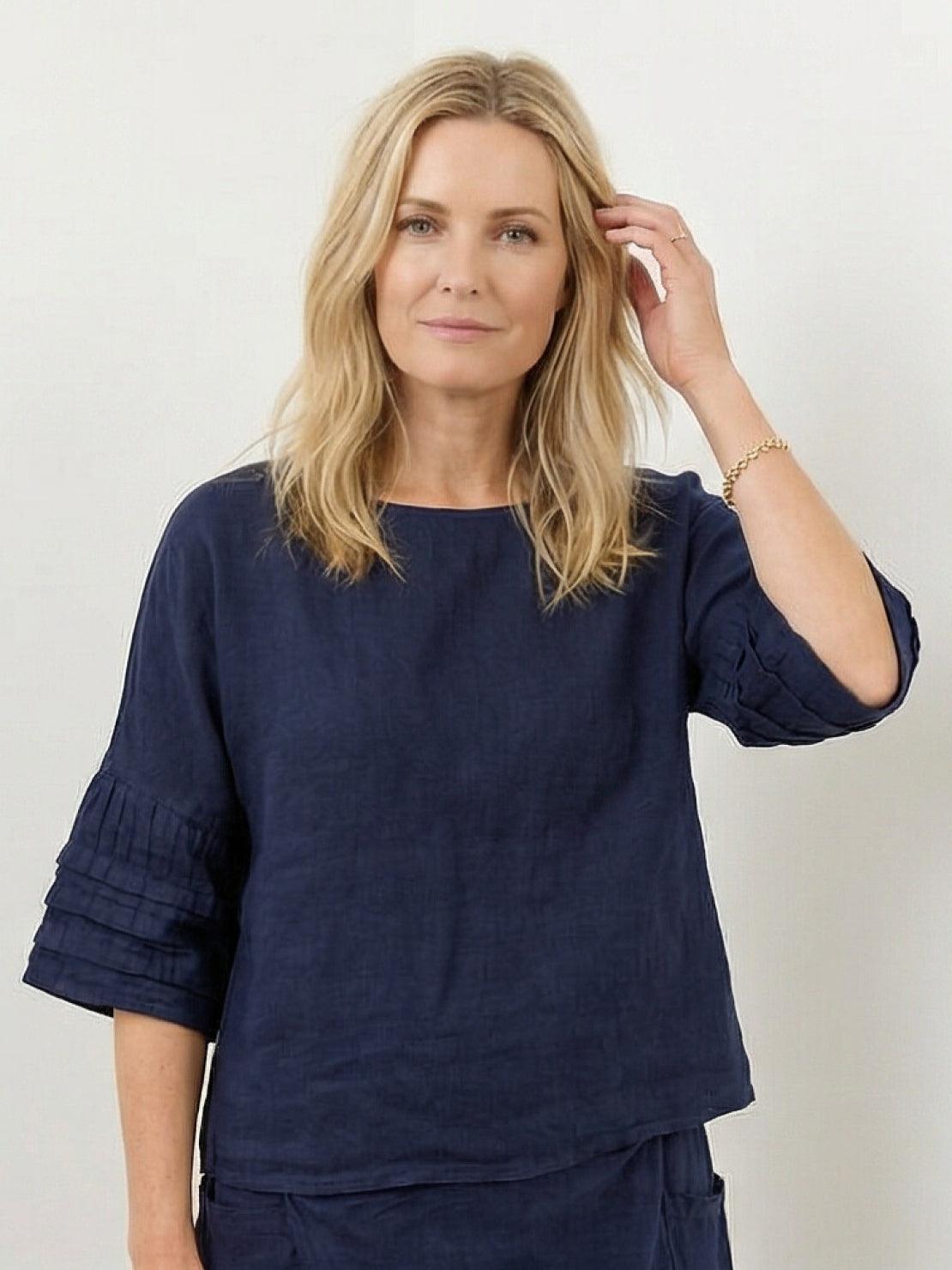 Two-piece 100% cotton wrap skirt and hip-length top set with crinkle texture and deep pockets