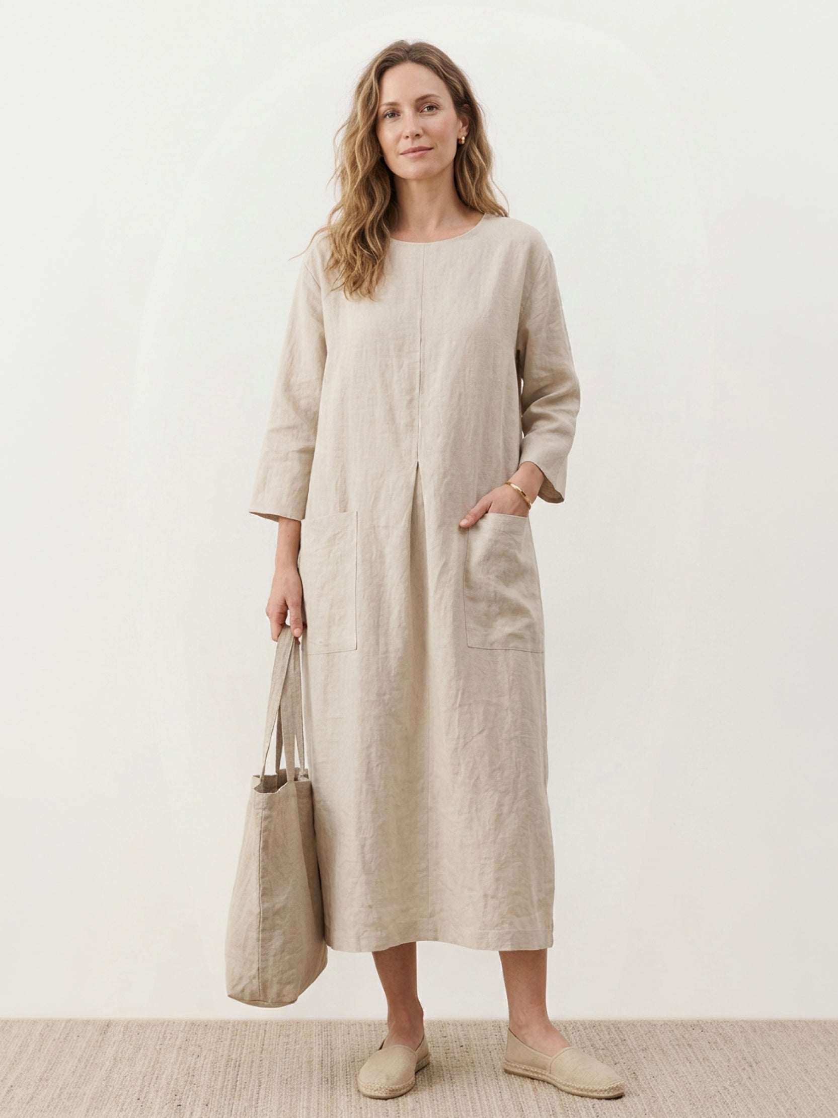 100% linen A-line maxi dress with 3/4 sleeves and large patch pockets