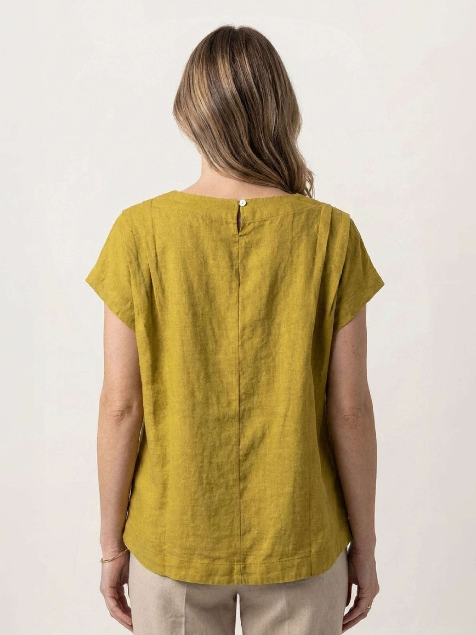 100% linen boxy cap-sleeve top with round scoop neck and hip-length hem