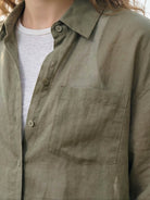 White 100% linen sheer overshirt with classic collar and oversized fit