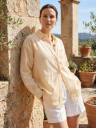 100% linen sheer overshirt with relaxed fit, classic collar, and semi-transparent fabric