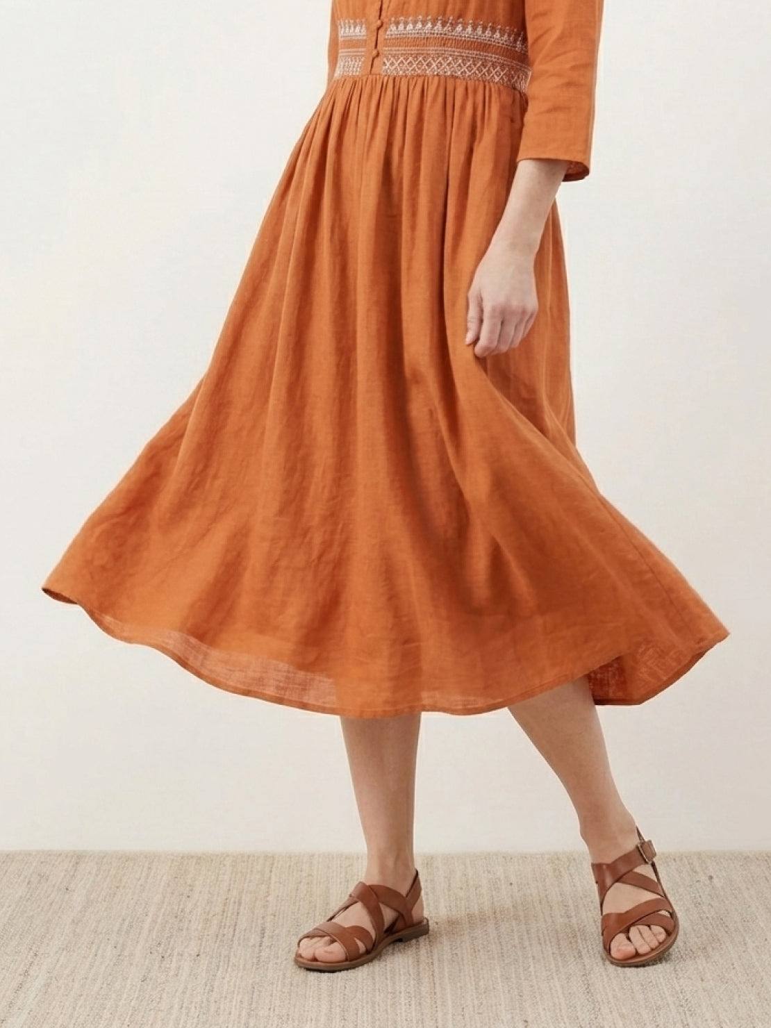 Rusty orange cotton linen midi dress with smocked waist and embroidery