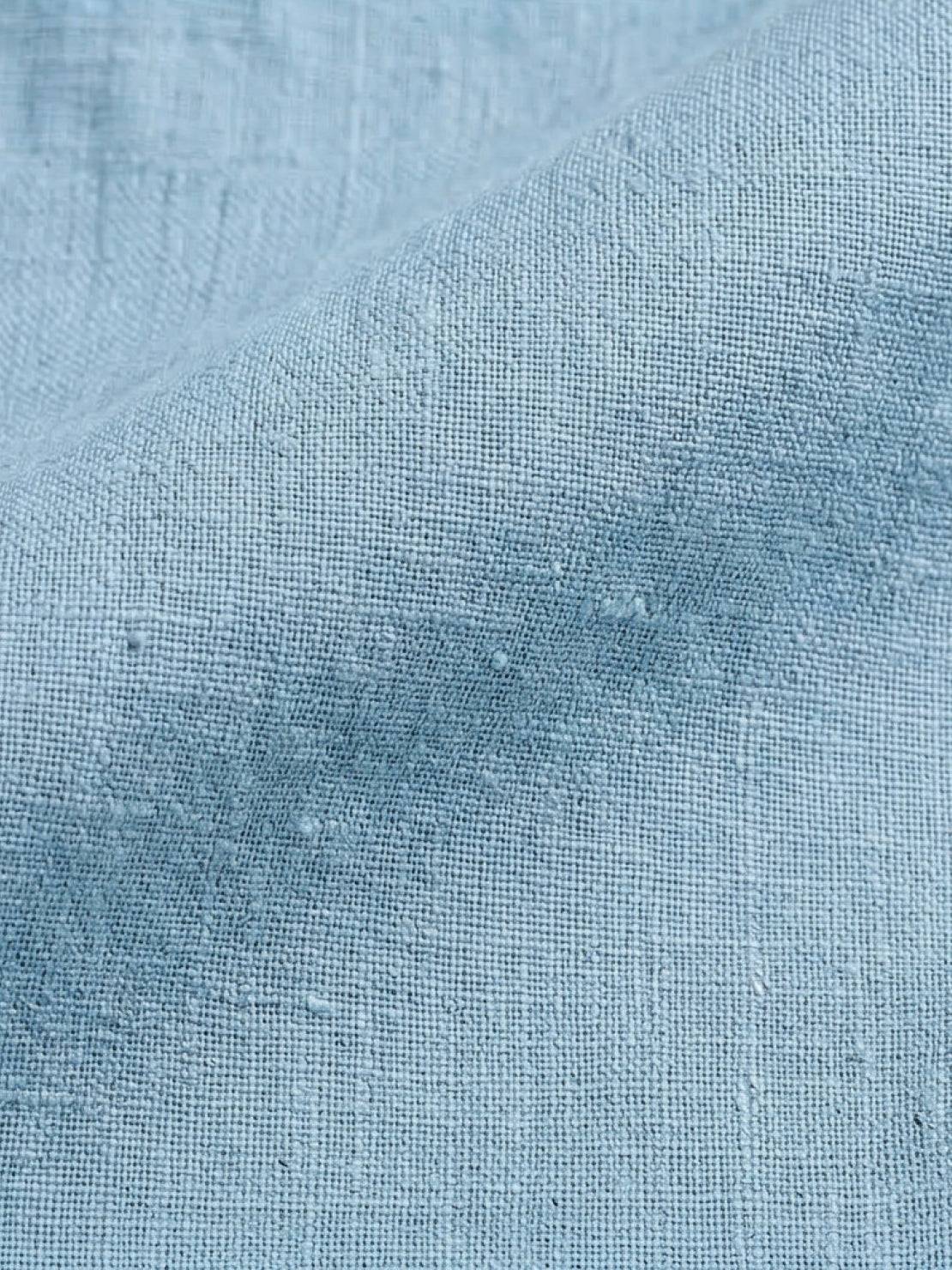 100% cotton linen sleeveless top with relaxed fit and chest pocket detail