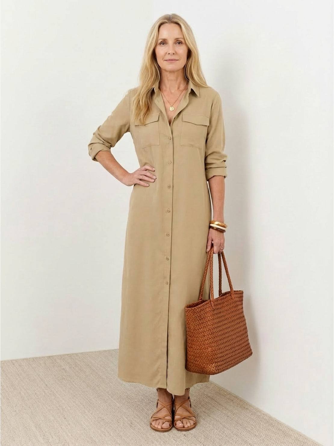 Wrinkle-free maxi button-down dress with point collar, chest pockets, and side slits