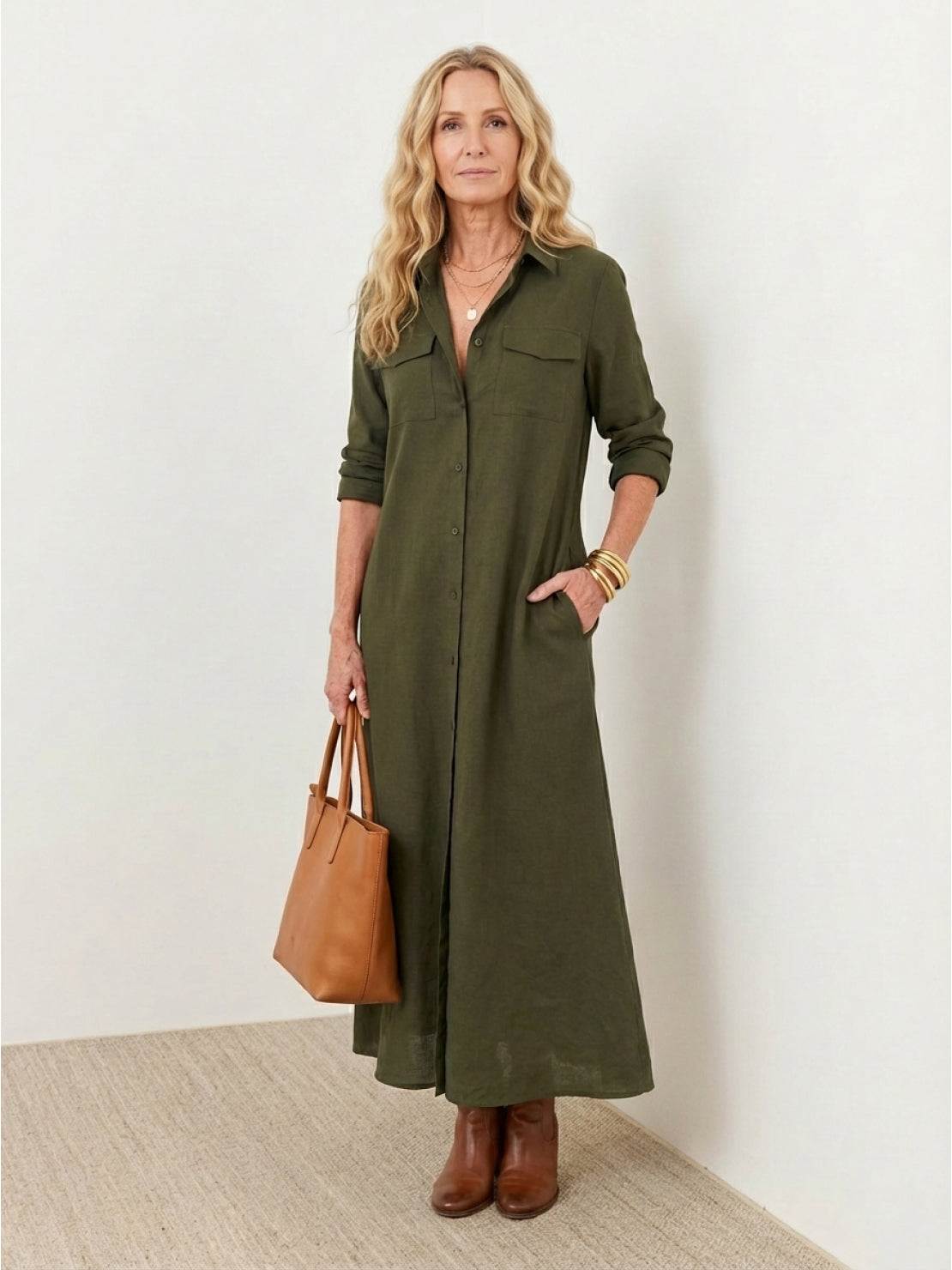 Wrinkle-free maxi button-down dress with relaxed fit, point collar, chest pockets, and side slits for movement