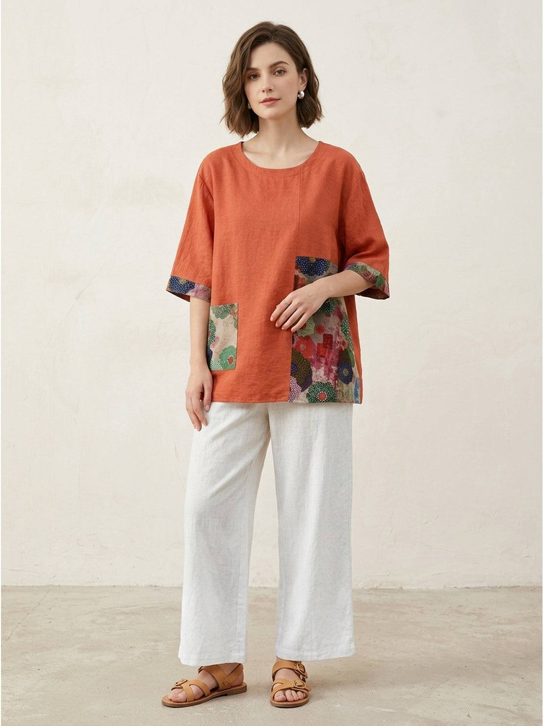 Oversized cotton linen floral shirt with elbow-length sleeves and bold botanical panel
