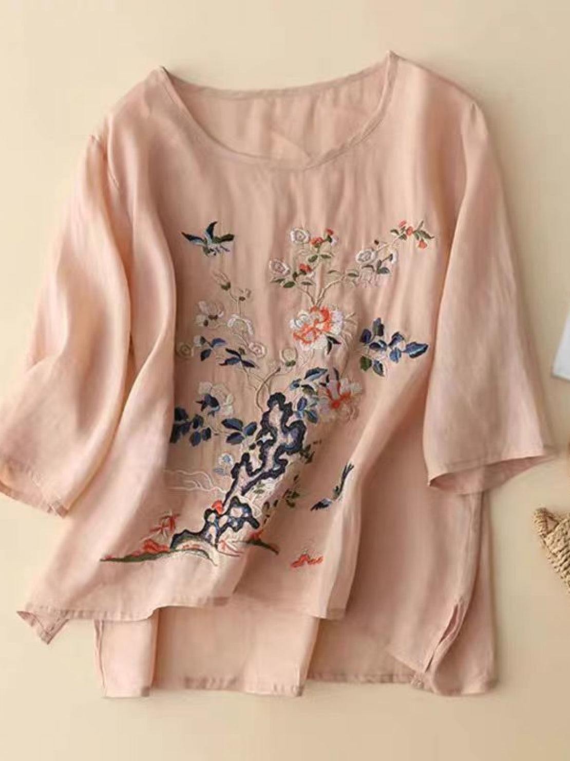 100% cotton linen hand-embroidered shirt with 3/4 flared sleeves and asymmetric hem