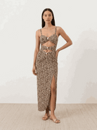 Gold-detail cutout one-piece swimsuit with ruched panels and midi wrap skirt beachwear set