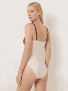 Gold-detail cutout one-piece swimsuit with ruched panels and midi wrap skirt beachwear set