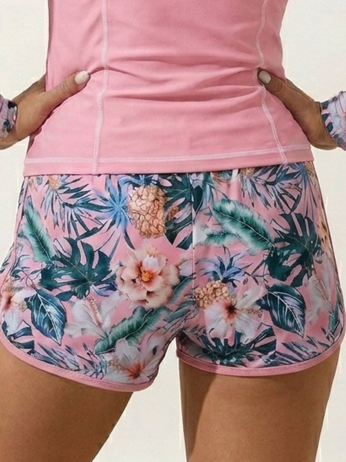 Long-sleeve UV rash guard set with tropical print swim shorts and adjustable drawstring hem