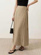 Asymmetrical wrap maxi skirt with side tie closure and flowy lightweight fabric