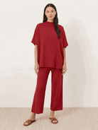 Chocolate brown cotton-blend capelet top with batwing sleeves paired with cropped wide-leg pants lounge set