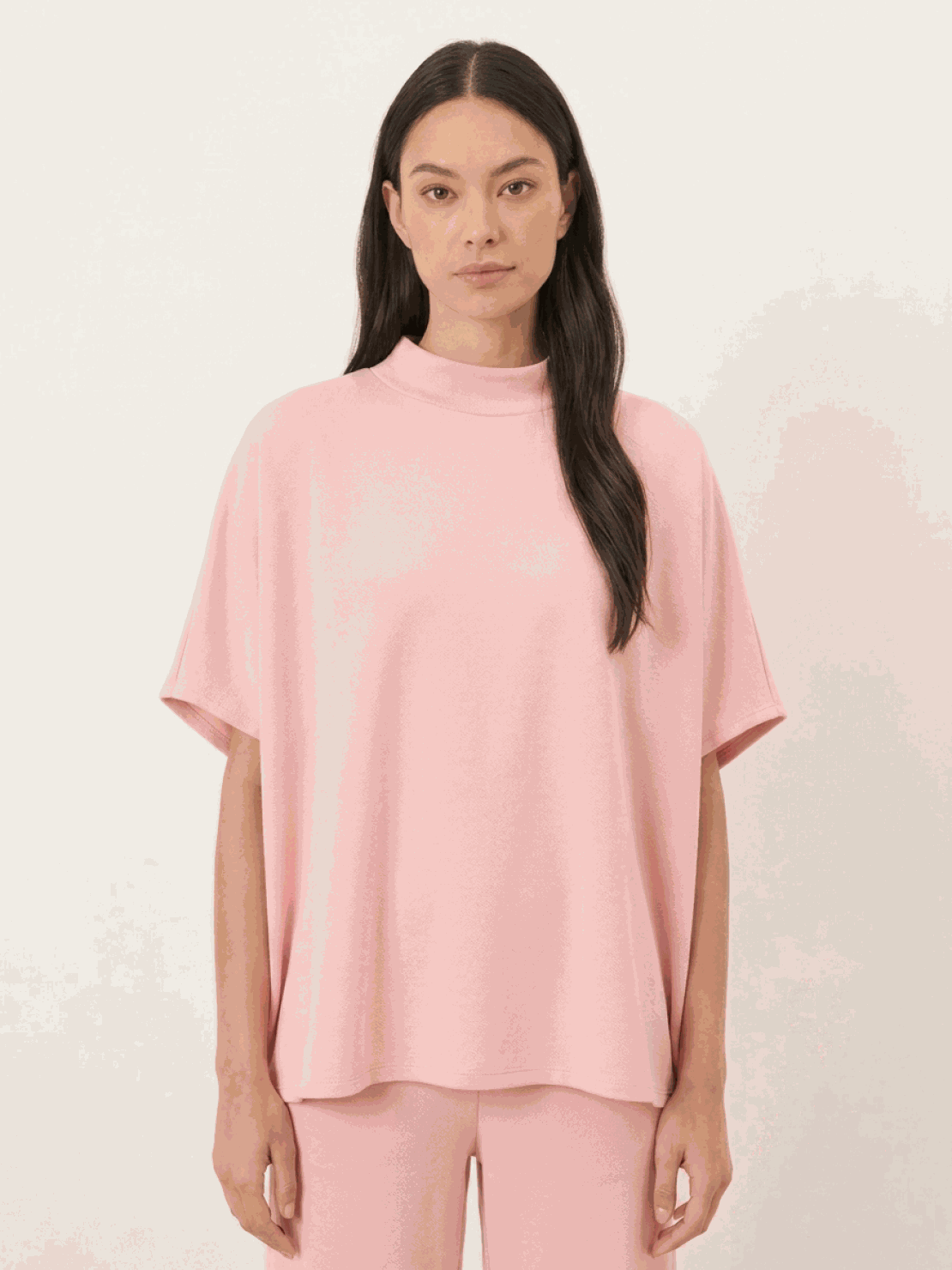 Women wearing cotton-blend capelet top with batwing sleeves and cropped wide-leg pants lounge set