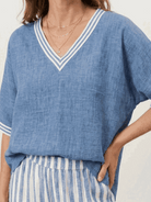 Black striped wide-leg co-ord set with oversized top and palazzo pants with contrast stripe trim and elastic waist