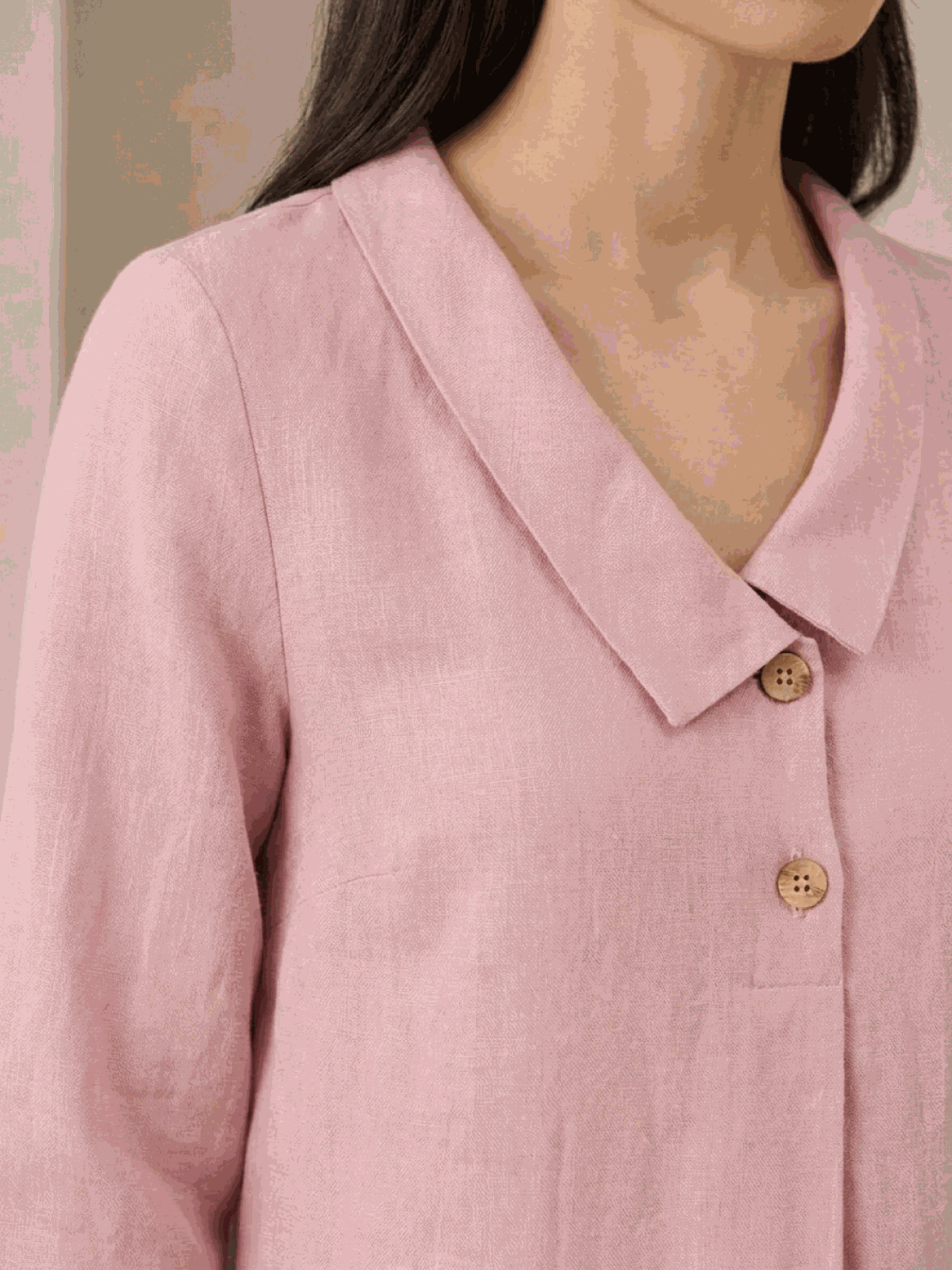 woman wearing navy linen-look midi dress with blazer neckline and button detail standing outdoors