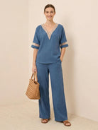 Lightweight linen top with relaxed boxy fit and button detail for mature women