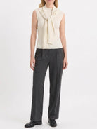 knit vest with attached scarf in fine ribbed knit and sleeveless design